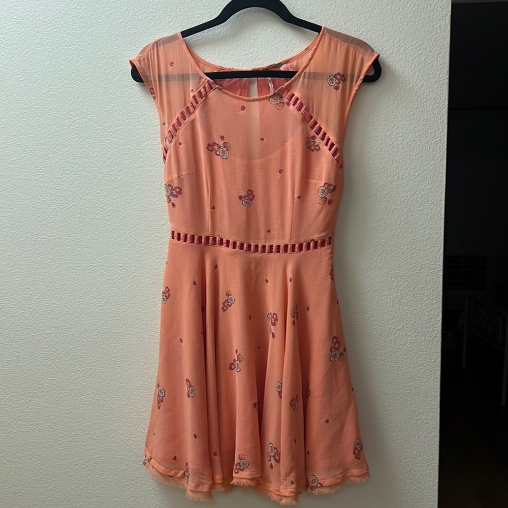 Peachy sundress with small floral print